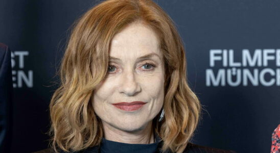 With her notched bob and red lips Isabelle Huppert takes